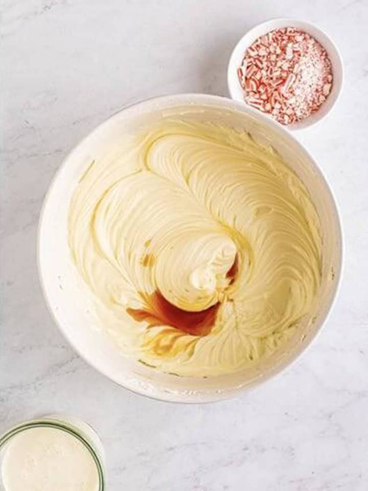 Vanilla and peppermint extract added to the cream cheese mixture for peppermint cheesecake.