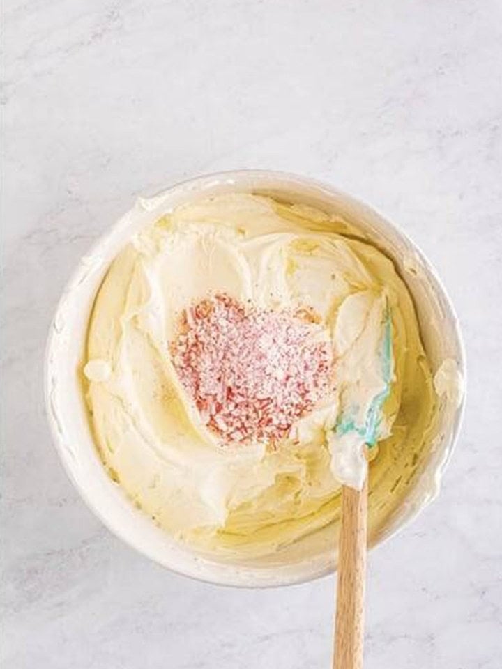Crushed candy canes folded into the peppermint cheesecake filling.
