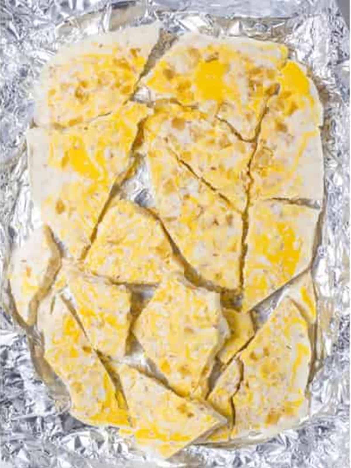 Set pina colada bark broken into chunks on the foil.