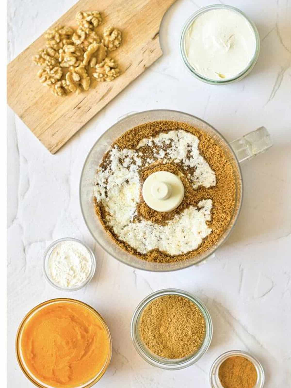 Biscoff cookie crumbs and melted butter in a food processor for the crust.