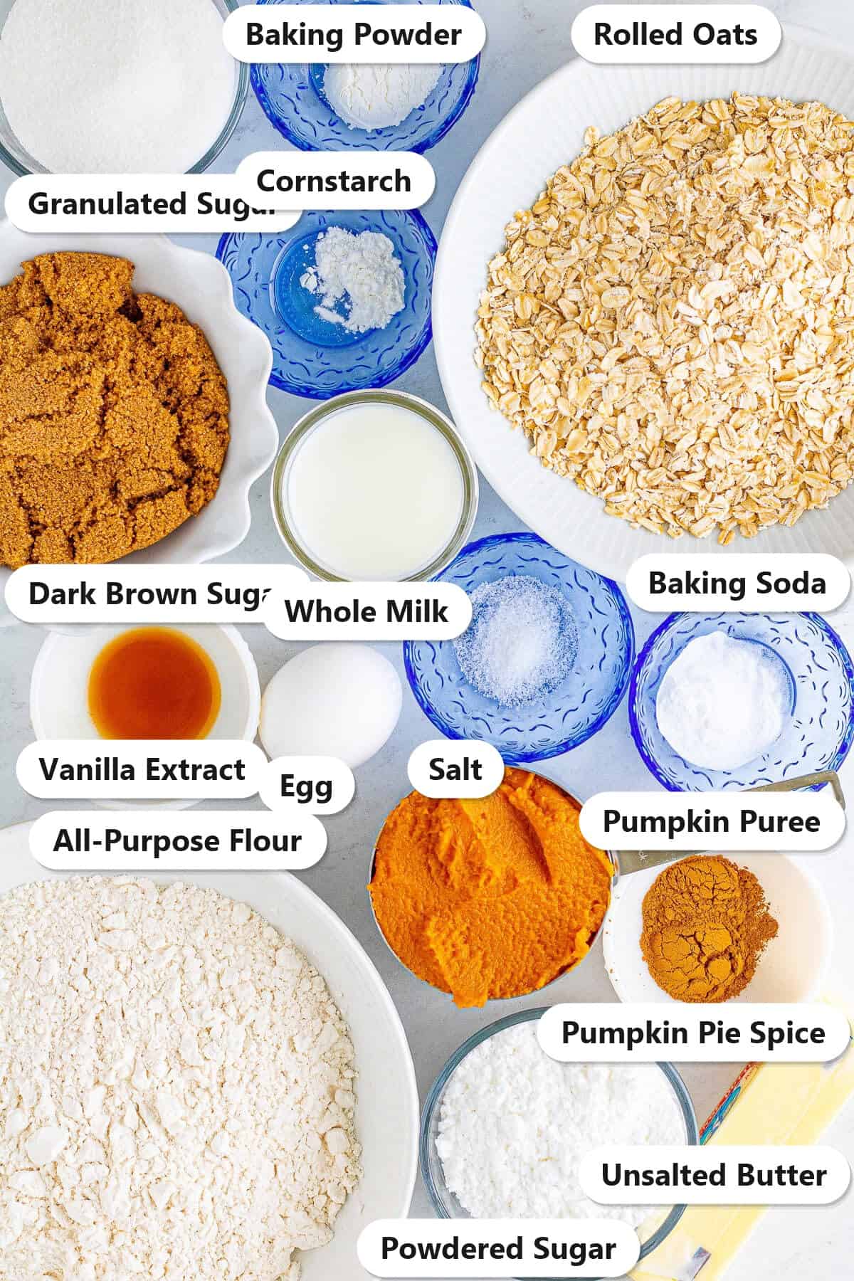 Labeled ingredients needed to make Pumpkin Oatmeal Cookies.