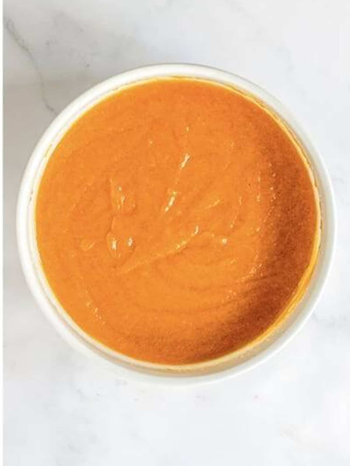 Pumpkin and vanilla stirred into the wet ingredients until smooth.