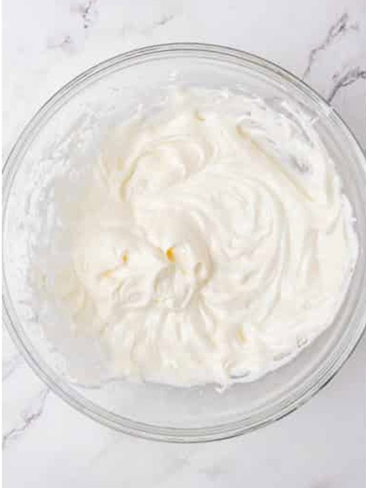 Cream cheese and marshmallow fluff whipped together into a smooth fluff frosting.
