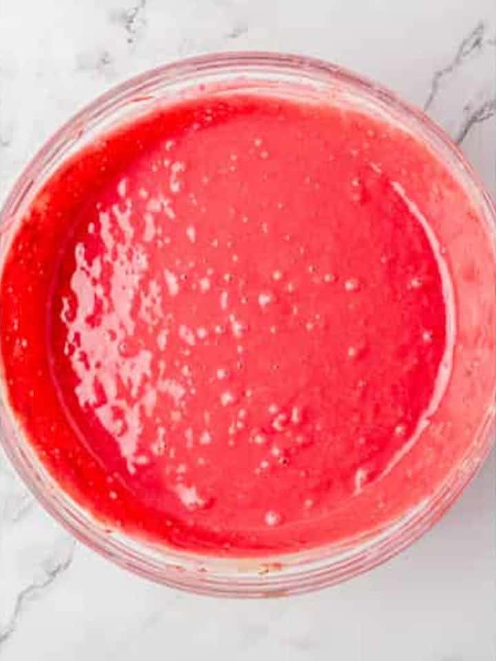 Red gel food coloring mixed into the pancake batter until vibrant red.