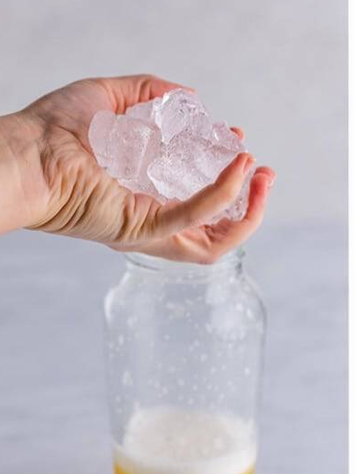 Adding a handful of ice to the shaker before the second shake.