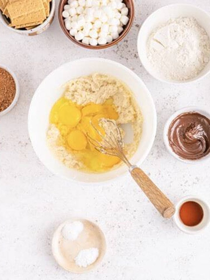 Butter, sugars, and eggs whisked together for the brownie batter.