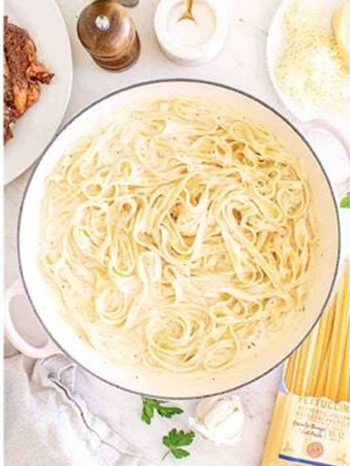 Fettuccine tossed to coat in the creamy alfredo sauce for Steak Alfredo.