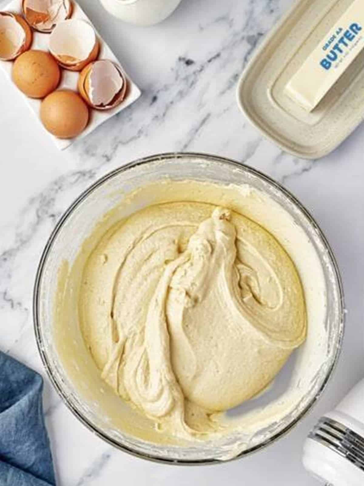 Smooth cupcake batter after mixing in the flour, baking powder, and salt.