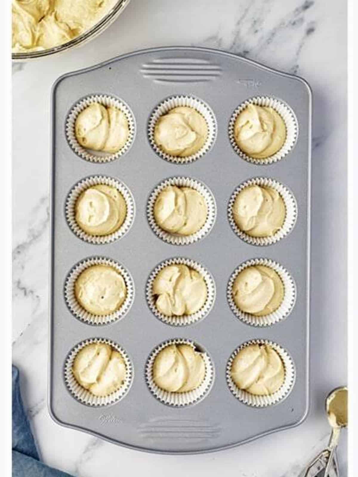 Cupcake tin filled halfway with Valentines Day Cupcakes batter.