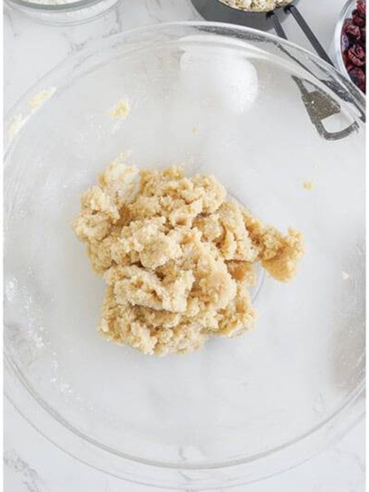 Creamed butter and sugars with egg and vanilla added for White Chocolate Cranberry Cookies dough.