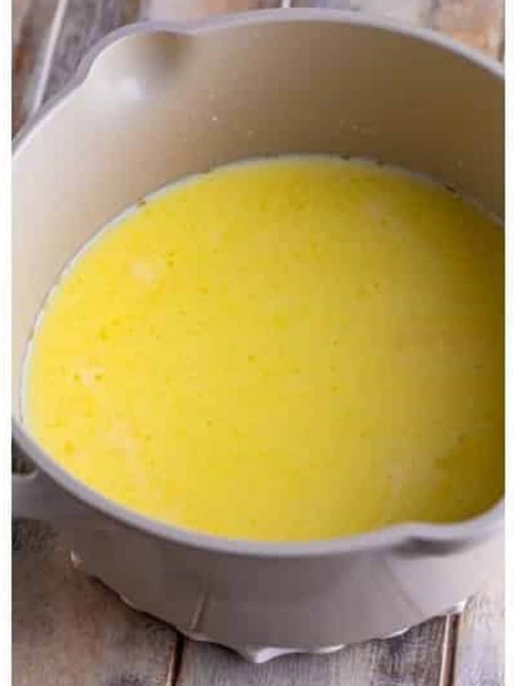 Melted butter and cream in the saucepan, smooth and golden.