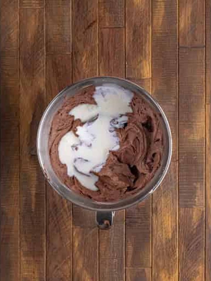 Buttermilk being stirred into the chocolate Whoopie Pies cake batter.
