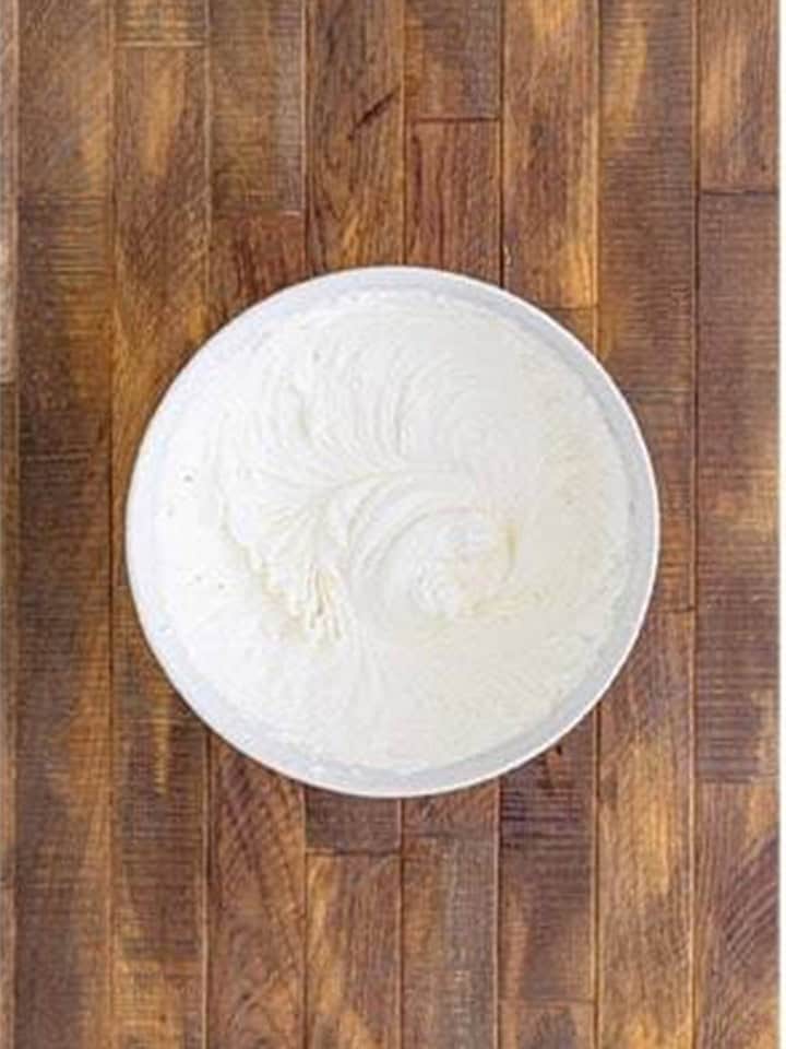 Whipped marshmallow creme filling for Whoopie Pies in a white bowl.