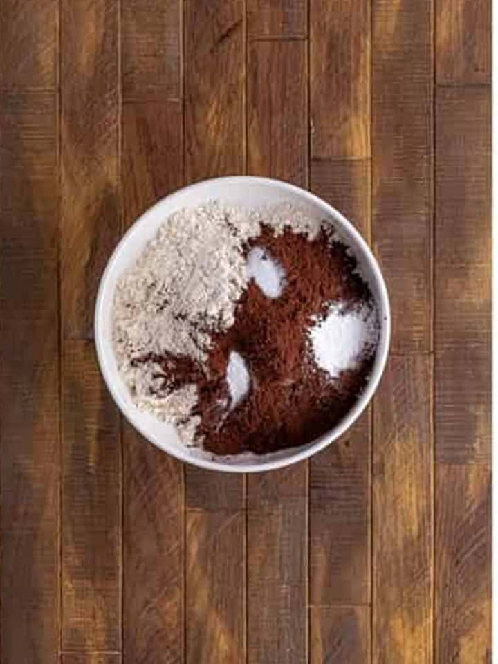Flour, cocoa powder, baking powder, baking soda, and salt in a mixing bowl for Whoopie Pies.