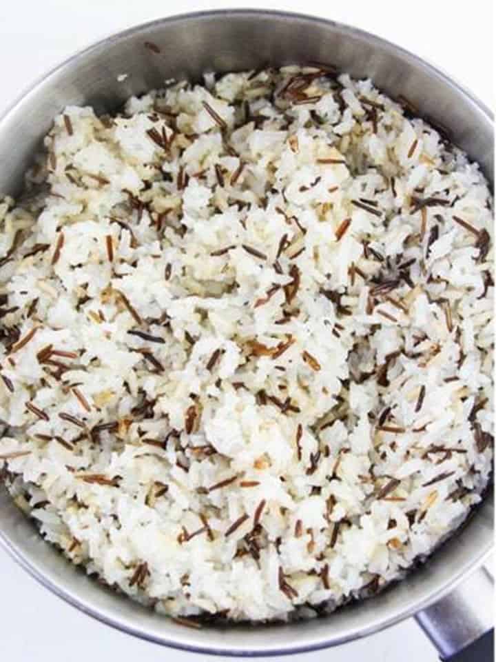 Toasting the wild rice blend in a pot with oil for Wild Rice Pilaf.