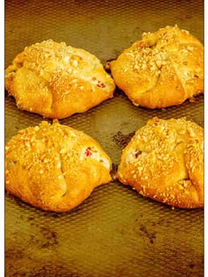 Chicken Crescent Rolls baked until golden brown on the baking sheet.