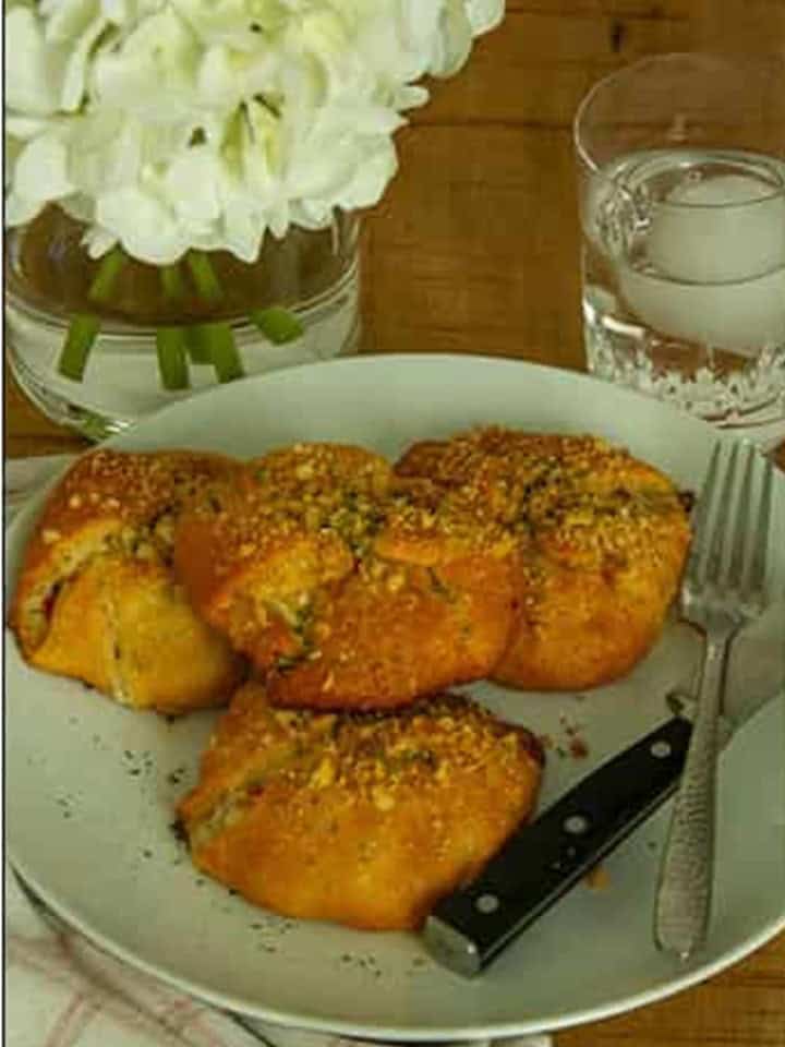 Baked Chicken Crescent Rolls served warm on a white plate.