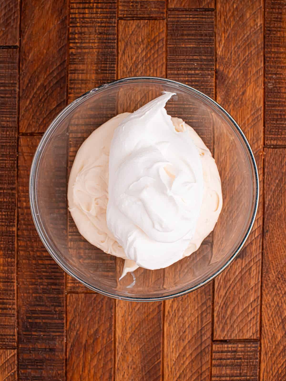 Whipped topping folded into the cream cheese mixture to make a fluffy no bake cheesecake filling.