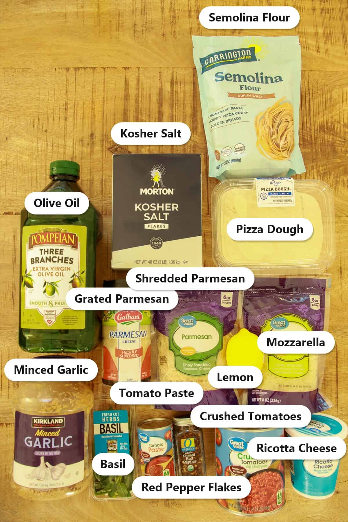 Labeled ingredients for smoked pizza including pizza dough, three cheeses, semolina flour, and homemade tomato sauce ingredients.